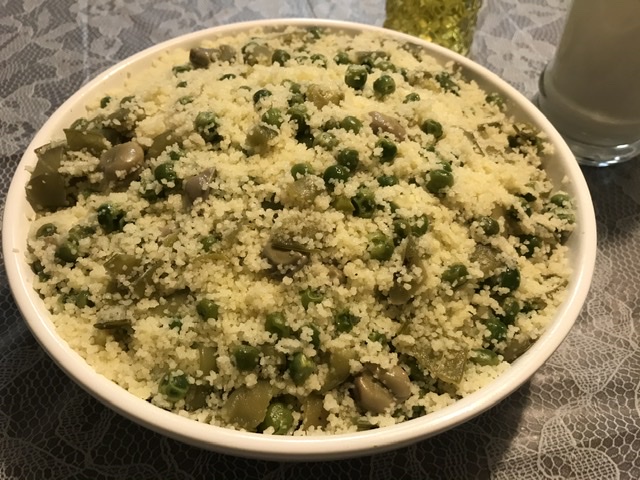 Couscous with beans (feva) and olive oil